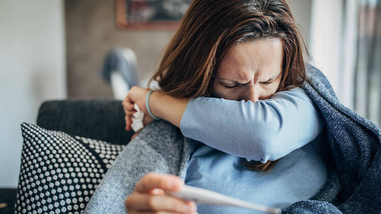 covid or flu symptoms story image