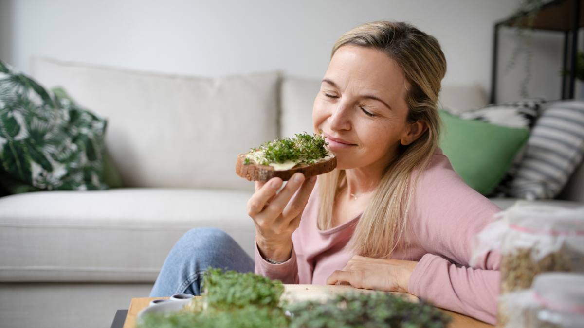 Woman eating toast