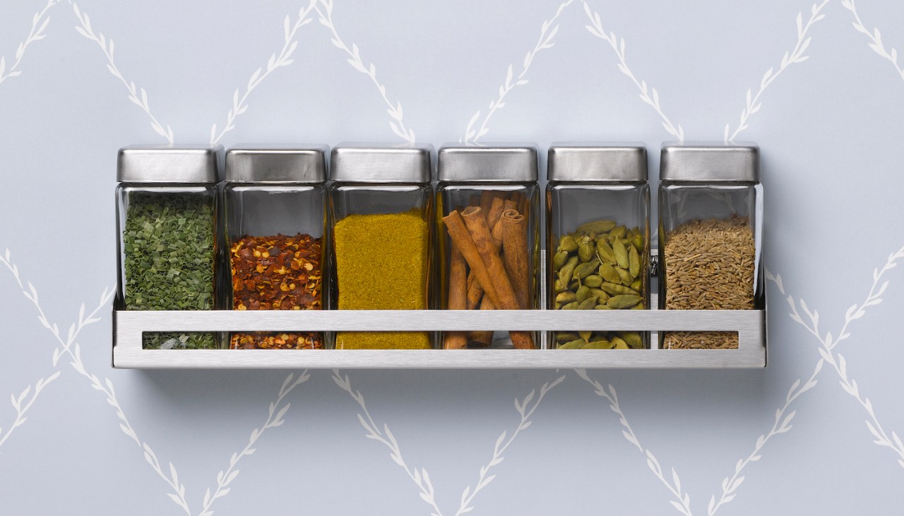 Spice rack hanging on wall
