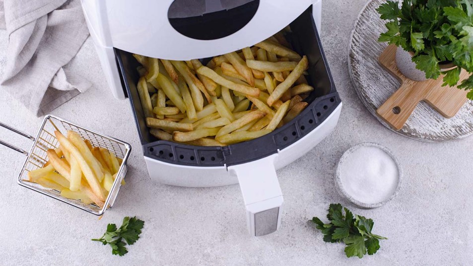 https://www.firstforwomen.com/wp-content/uploads/sites/2/2022/03/Air-fried-fries-with-parsley-and-salt.jpg?w=953