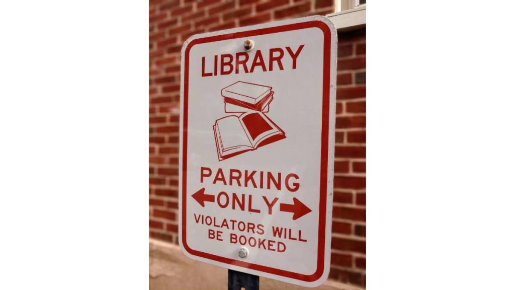 A Funny Library Parking Sign (Funny road signs )