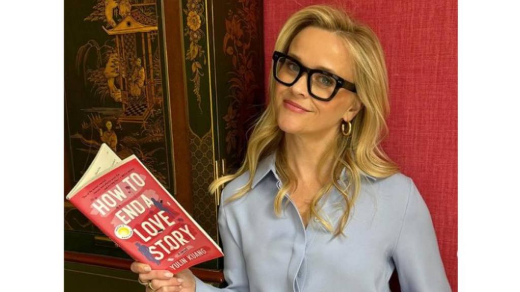 Reese’s Book Club: Reese with a book