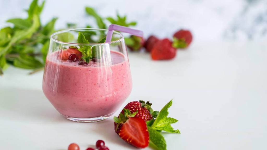 what to eat on ozempic: Morning breakfast natural organic smoothie with yogurt and strawberries