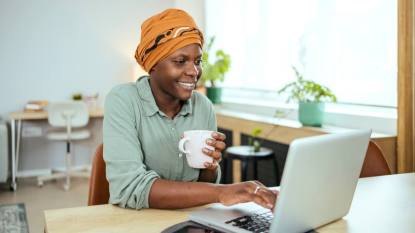 best state to work remotely: Beautiful black woman working from home