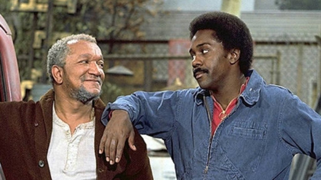 Redd Foxx and Demond Wilson in ‘Sanford and Son' (1973), both of them in the show's junkyard set.