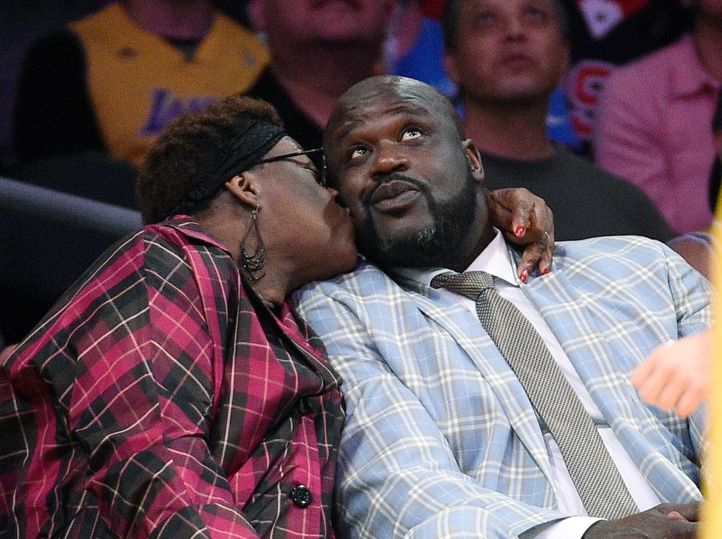 Shaquille O'Neal getting a kiss from his mother Lucille in 2017