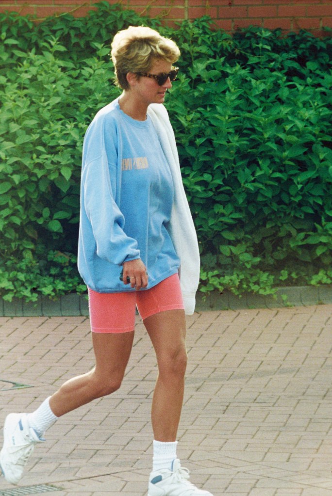 The princess wearing a pale blue sweatshirt, pink cycling shorts and sunglasses, leaves Chelsea Harbour Club on August 24, 1994 in London, United Kingdom