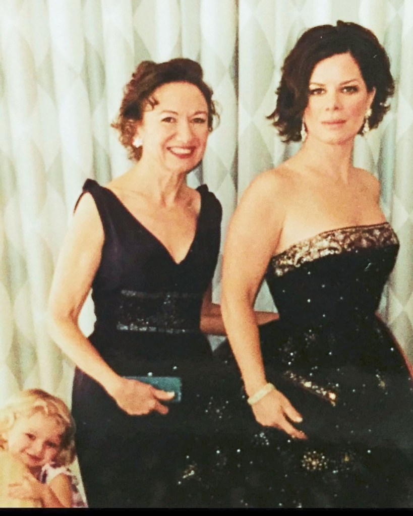 Marcia Gay Harden pictured with her mother, both wearing black gowns